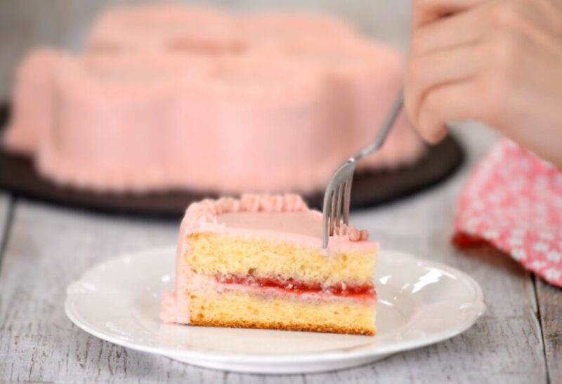 Yellow Birthday Cake with Fluffy Pink Frosting